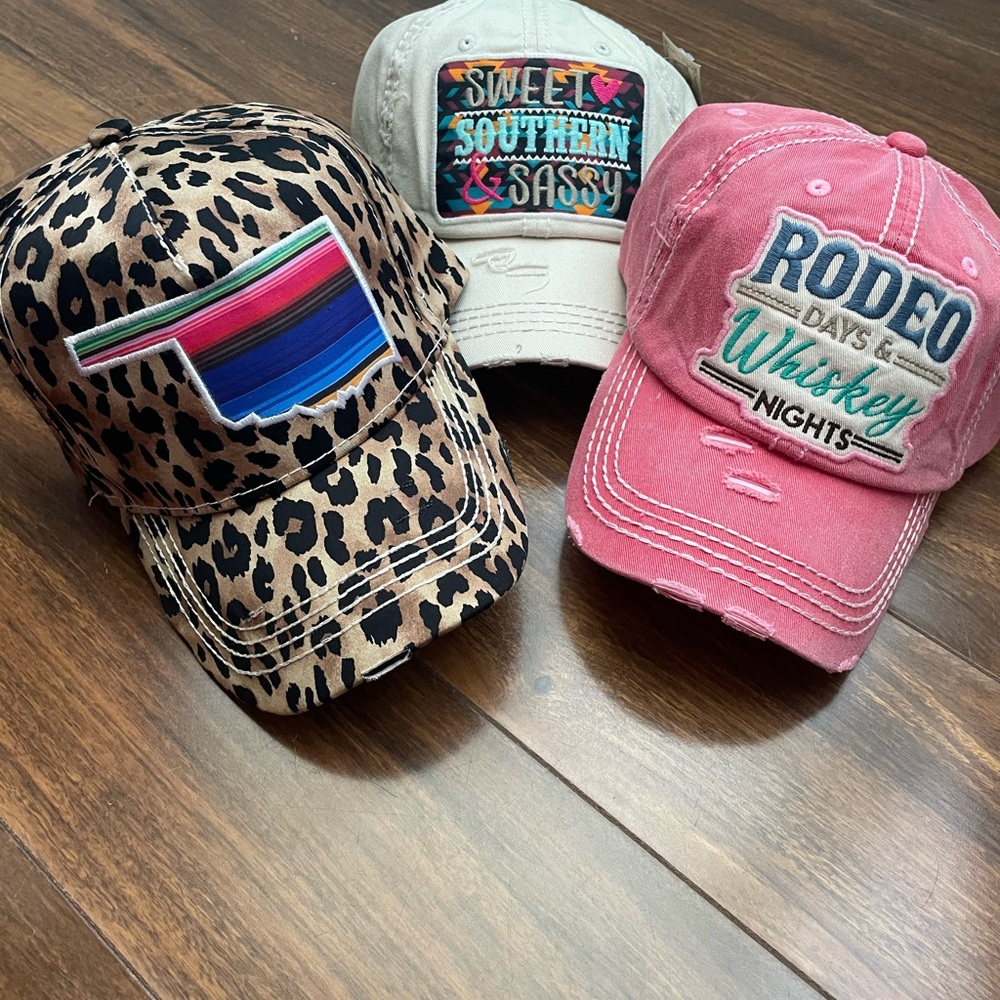 Cute hats!Brand new!Cheetah print is sold price is for the other 2 thanks!!😊
